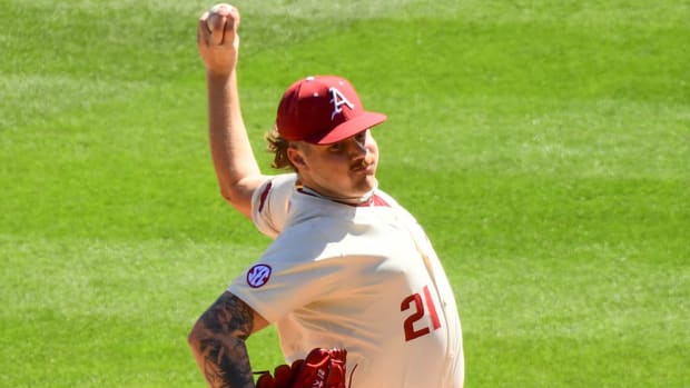 Razorbacks' Mason Molina throws a pitch against Missouri